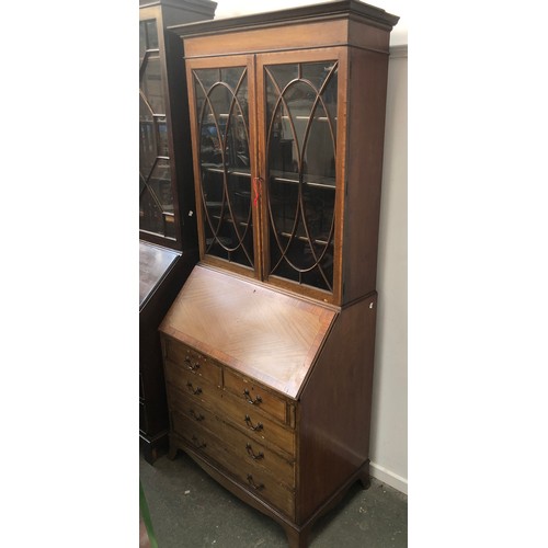 1033 - An early 20th century mahogany and crossbanded glazed bureau bookcase, 92x51x208cmH