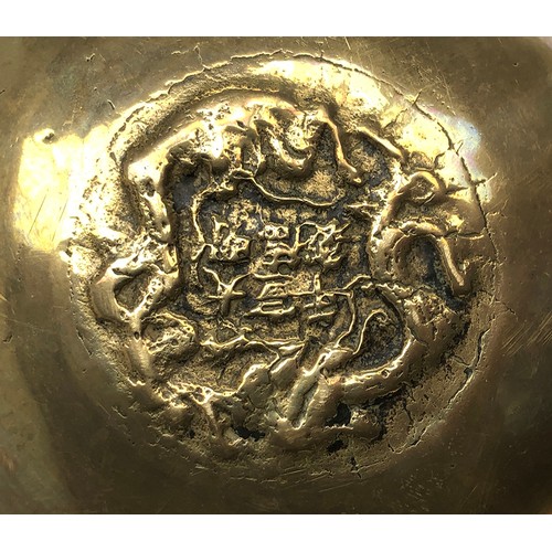 272 - A large early 20th century Chinese brass singing bowl, Xuande mark to base, 25.5cmD, 12cmH; together... 