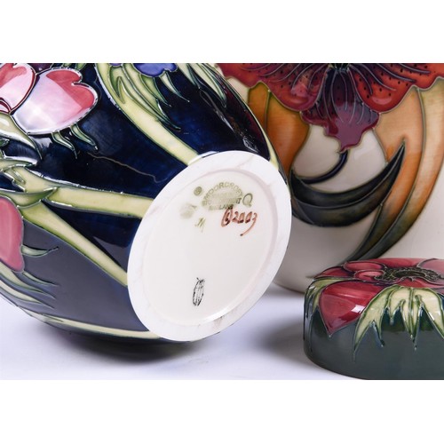 106A - Two Moorcroft ginger jars and covers, one in Anna Lily pattern, c. 1998, 21cm high, the other in Ane... 