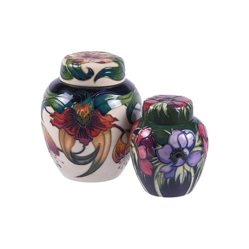 106A - Two Moorcroft ginger jars and covers, one in Anna Lily pattern, c. 1998, 21cm high, the other in Ane... 