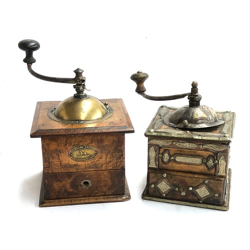 103A - A vintage French Peugeot Freres coffee grinder; together with a further vintage coffee grinder