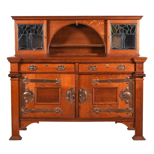 1040 - An oak and copper mounted sideboard, c1900, the superstructure with glazed and leaded doors, 169x68x... 