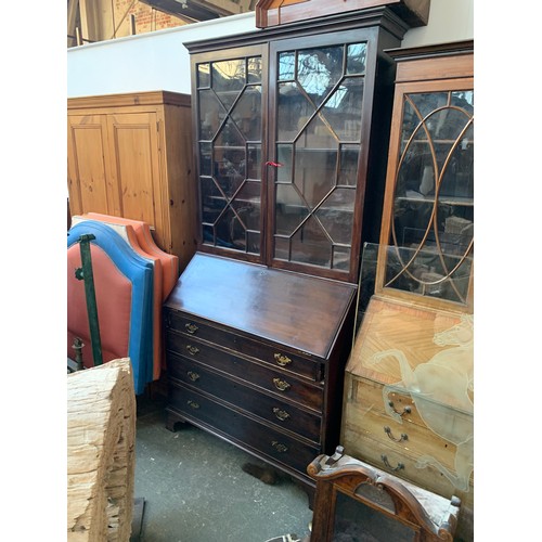 1032 - A 19th century glazed bureau bookcase, adjustable shelves, fall front over four graduating drawers, ... 