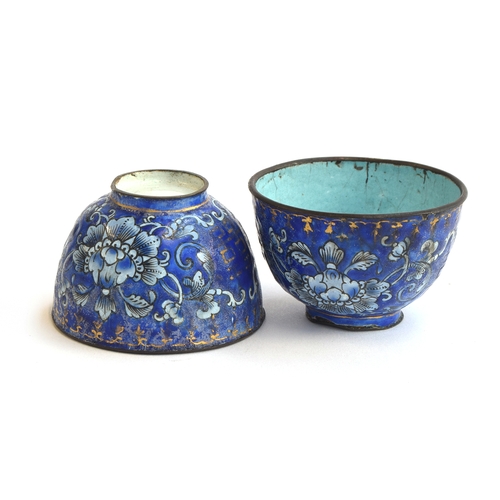 195 - A pair of Chinese Canton enamel cups, cobalt blue ground decorated with scrolling florals, heightene... 