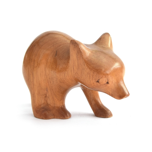 169 - Virgil Ledford (1940-2018), a carved Native American wooden figurine of a bear cub, signed to unders... 