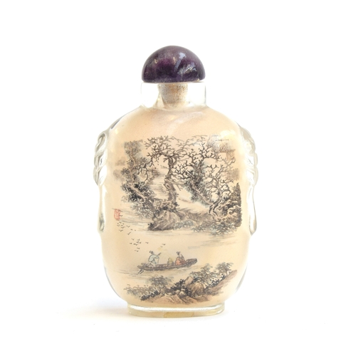 184 - A Chinese inside painted carved rock crystal snuff bottle with amethyst stopper, one side depicting ... 