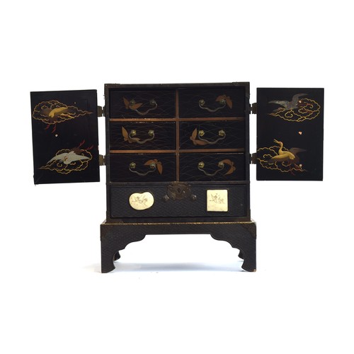 187 - A Japanese Meiji era lacquered kodansu table cabinet and stand, inset with six Satsuma porcelain pla... 