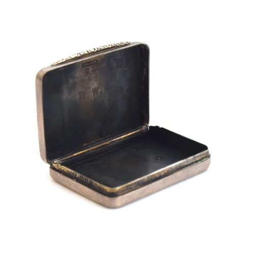 127 - A George V silver rounded rectangular vesta box by Thomas Callow & Son, London 1917, foliate thumbpi... 