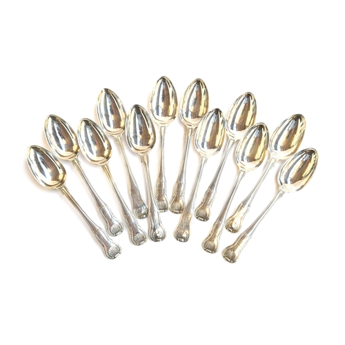 74 - A set of 12 George III King's Pattern dessert spoons, eight by William Eley & William Fearn, London ... 