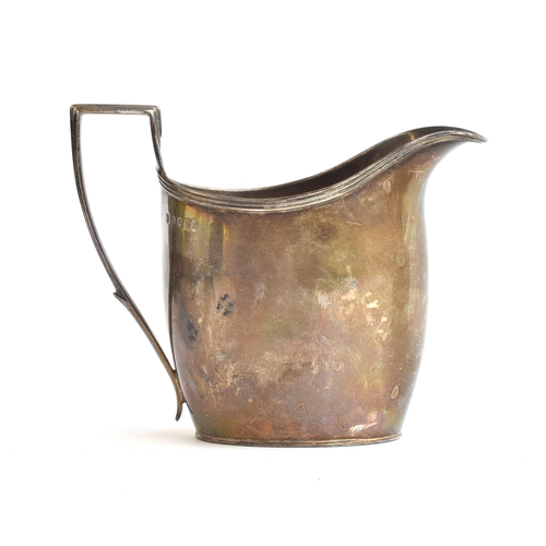 102 - A George III silver milk jug by John Emes, London 1801, with reeded handle and rim, 10cm high, 5.3oz... 