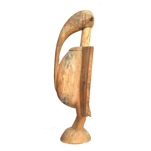 692 - An extremely large Senufo wooden hornbill bird sculpture, Ivory Coast, 100cm wide, 250cm high

PLEAS... 