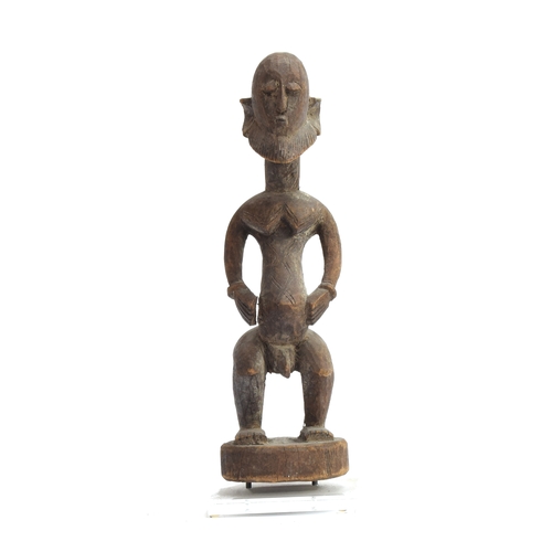 695 - A Teke carved wood Ancestor figure, Zaire, 32cm high

PLEASE NOTE THAT FOR THIS LOT VAT WILL BE CHAR... 