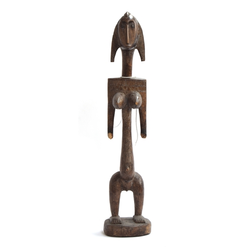 697 - A Senufo maternity figure, carved wood, Ivory Coast, 70cm high

PLEASE NOTE THAT FOR THIS LOT VAT WI... 