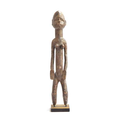 693 - A Senufo maternity figure, carved wood, Ivory Coast, 66cm high

PLEASE NOTE THAT FOR THIS LOT VAT WI... 