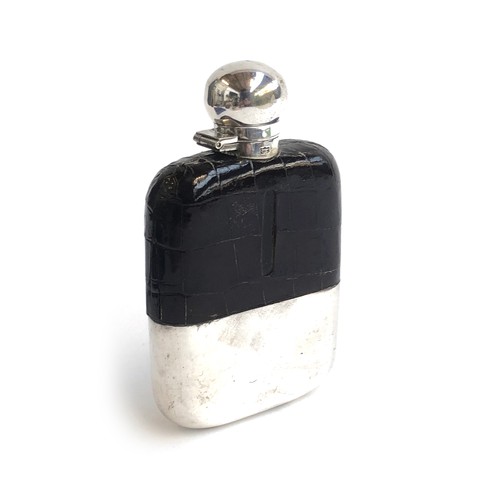 123 - A silver plated, glass, and pressed leather hip flask, swivel hinged cap, 14cm high