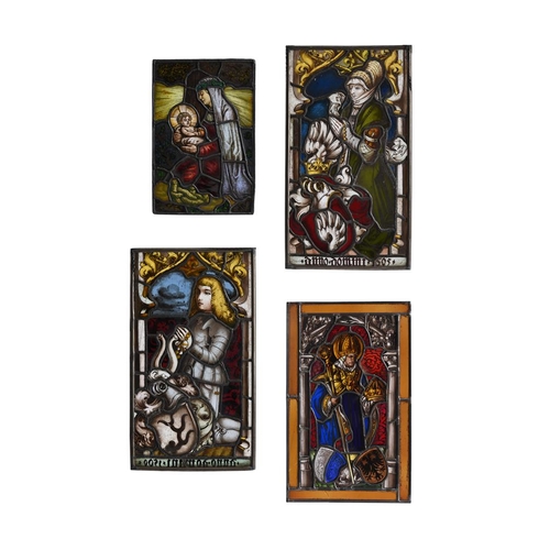 283 - A pair of German stained and leaded glass panels, 19th century, depicting donors in Medieval dress, ... 