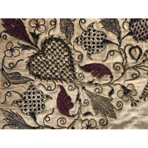 278 - A fine 19th century silk blackwork table carpet (af), the profuse floral border with metal thread, p... 