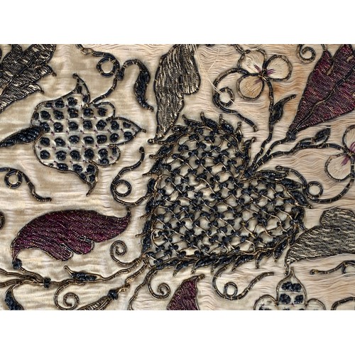 278 - A fine 19th century silk blackwork table carpet (af), the profuse floral border with metal thread, p... 