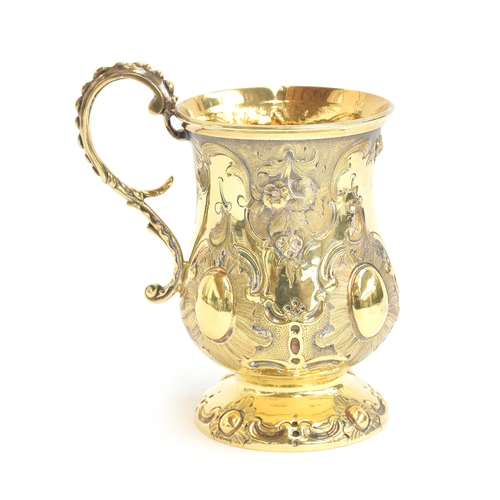 117 - A Victorian silver gilt tankard by George John Richards & Edward Charles Brown, London 1857, the bal... 