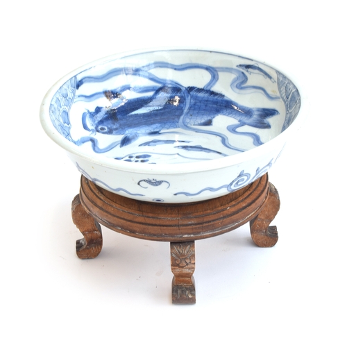 206 - A Chinese blue and white bowl, the interior decorated with floral panels, sparrows on a river bank a... 