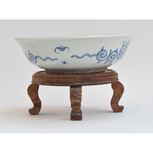 206 - A Chinese blue and white bowl, the interior decorated with floral panels, sparrows on a river bank a... 