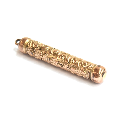 153 - A Victorian gilt metal mechanical pencil, the case with foliate engraving, 5cm long extending to 8.2... 