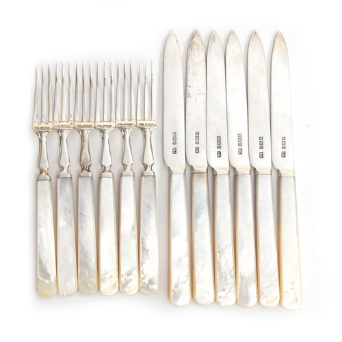 85 - A set of Edwardian silver and mother of pearl handled fruit knives and forks for six place settings,... 