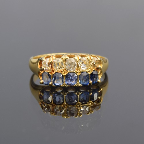 A late Victorian 18ct gold sapphire and old cut diamond two row ring, approx. 0.6ct of diamonds and 0.5ct of sapphires, hallmarked 18ct, size M, 3.3g