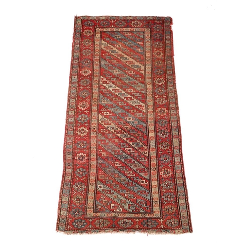 734 - A Caucasian runner rug, approx. 305 x 135cm