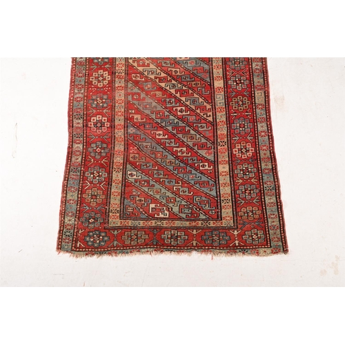 734 - A Caucasian runner rug, approx. 305 x 135cm