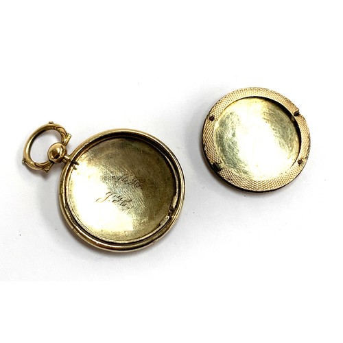 24 - A Victorian yellow metal circular locket (af), engine turned and engraved with initials MJH, 7.1g