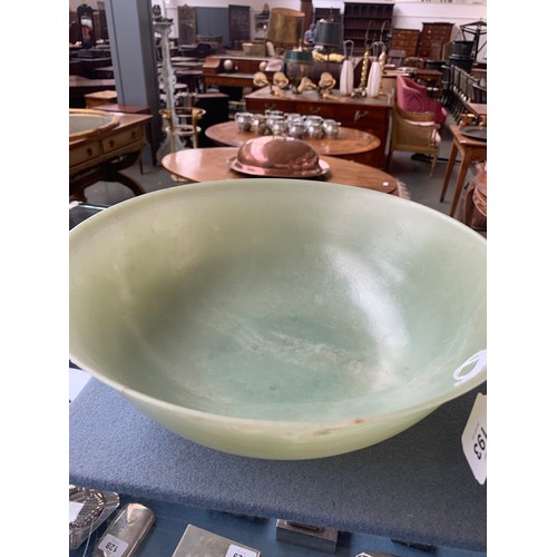 193 - A very large Chinese jade bowl, with carved Greek key border, 29cm diameter and 10.5cm high, on a ca... 