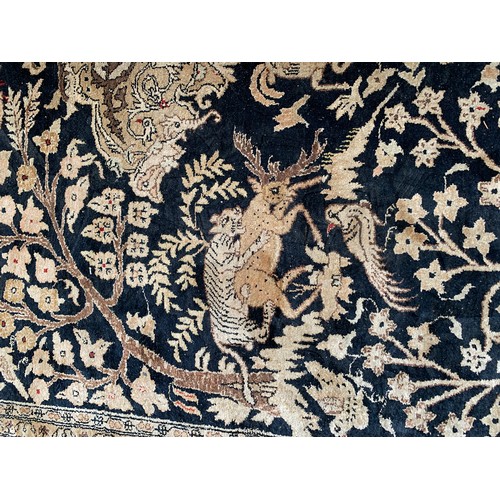 716 - Persian silk Qum rug, animals among foliage, 211x141cm