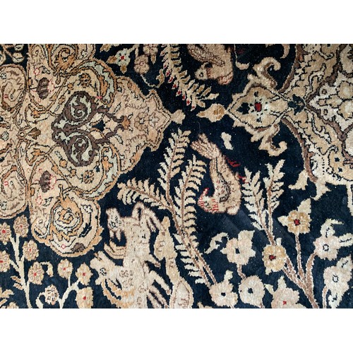 716 - Persian silk Qum rug, animals among foliage, 211x141cm