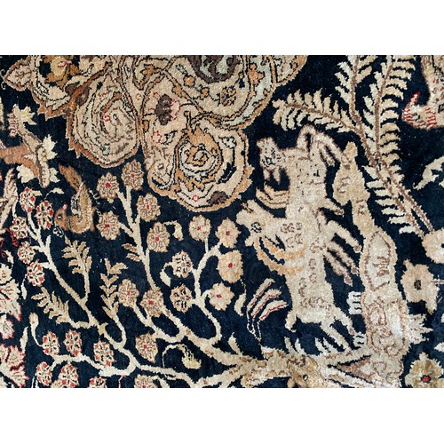 716 - Persian silk Qum rug, animals among foliage, 211x141cm