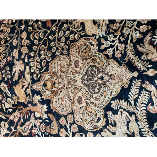 716 - Persian silk Qum rug, animals among foliage, 211x141cm