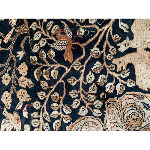 716 - Persian silk Qum rug, animals among foliage, 211x141cm