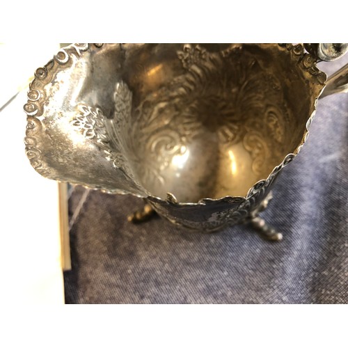 99 - An Edwardian chased silver teapot and sugar bowl by George Nathan & Ridley Hayes, Chester 1904 and 1... 