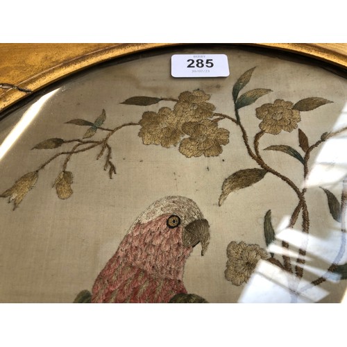 285 - A Georgian silk picture of a parrot perched on a branch, in a gilt gesso frame, 38x34cm