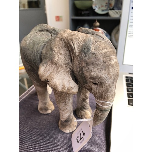 173 - Nick Mackman (b.1972), a raku sculpture of a baby elephant, incised signature to leg, 13.5cm high