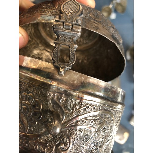 113 - An Indian Mughal silver pandan box, mid-19th century, in the form of a Mughal helmet, chased profuse... 