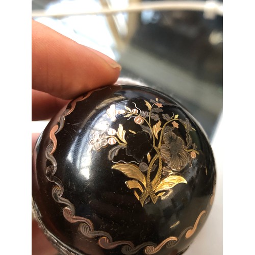 175 - A 19th century tortoiseshell and pique egg shape necessaire, the hinged cover decorated with a spray... 