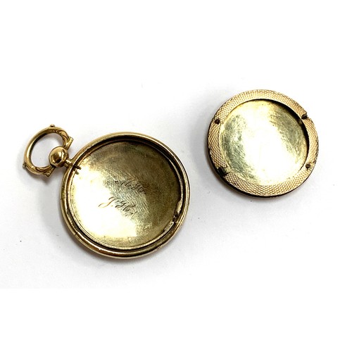 11 - A Victorian yellow metal circular locket (af), engine turned and engraved with initials MJH, 7.1g