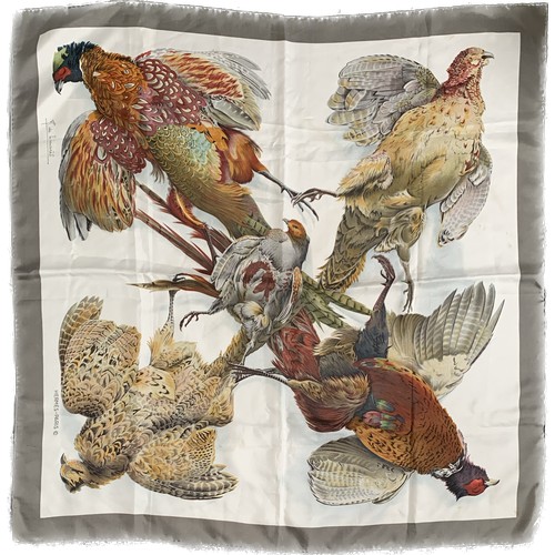 An Hermes silk scarf designed by Henri de Linares, pheasants on a