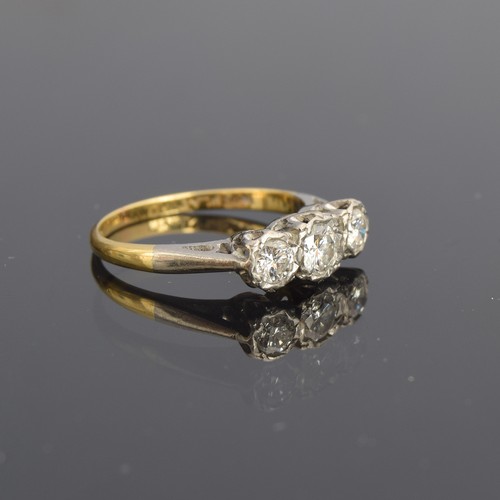 18 - An early 20th century 18ct gold and platinum diamond trilogy ring, total diamond weight approx. 0.5c... 