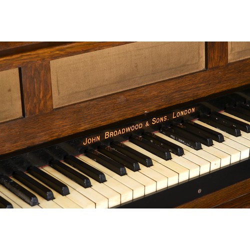 754 - An oak and brass mounted upright piano c.1900, by Mackay Hugh Bailie Scott (1865-1945) for John Broa... 