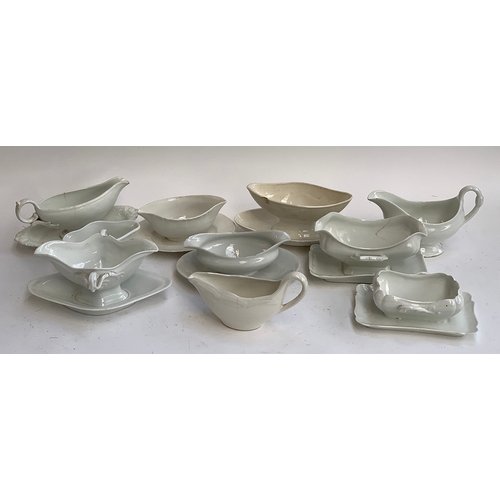 115 - A collection of 10 antique ceramic gravy boats