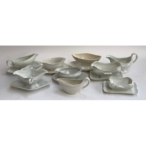 115 - A collection of 10 antique ceramic gravy boats