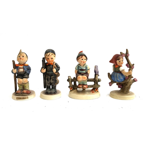 91 - Four Goebel Hummel figurines, the tallest 10cmH, to include Little Hiker, Chimney Sweep, Wayside Har... 