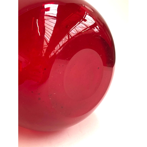 110 - A large mid century red glass vase, 25cmH; together with a small blue glass vase, 14cmH (2)